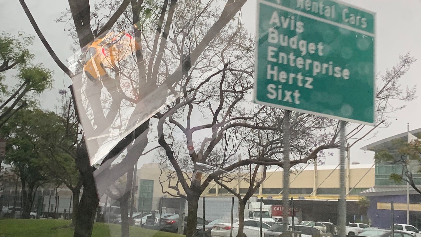 Signs for rental car companies at an airport